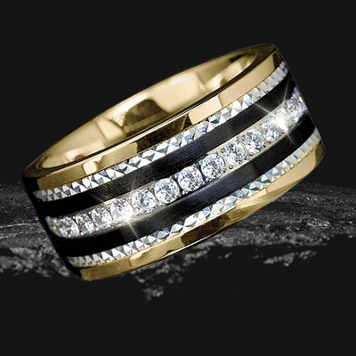 Phantom Gold Ring featuring a stainless steel band with gold plating, accented by black stripes and a row of sparkling clear gemstones, designed for men’s jewelry collections.