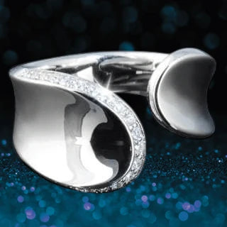 Pearl Twist Ring in sterling silver for females, featuring a sleek twisted design accented with small sparkling stones, perfect for elegant jewelry collections.