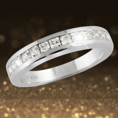 Elegant sterling silver Manhattan Stacker E ring for female featuring a row of sparkling square-cut stones in a sleek, polished band design.
