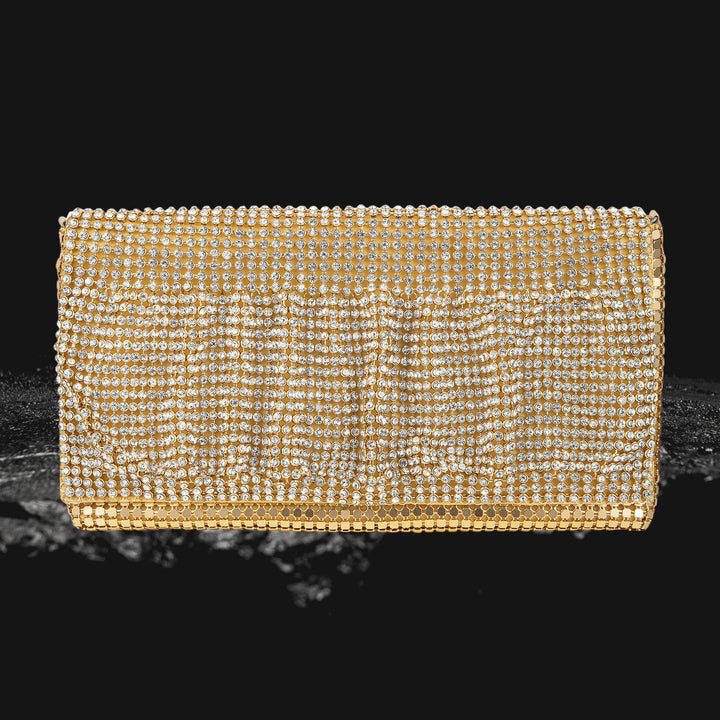 Gold Ruffle Clutchbag encrusted with shimmering crystals, designed for women seeking a glamorous and elegant accessory for evening wear or special occasions.