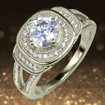 Isobella Rose Gold Ring crafted from sterling silver with rose gold plating, featuring a large central sparkling stone surrounded by smaller clear gemstones enhancing its elegant design.