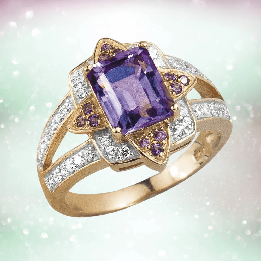 Amethyst Star Ring featuring a sterling silver band plated in rose gold, showcasing a central rectangular purple amethyst surrounded by smaller accent stones in a star-shaped design.