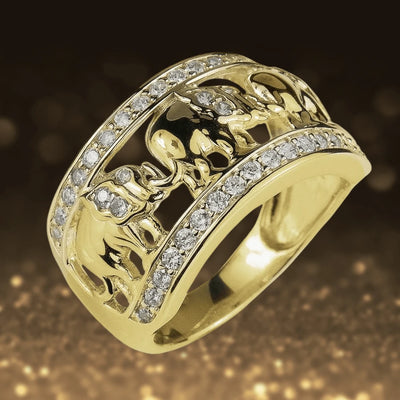 Elephant Parade Ring in sterling silver with gold plating, featuring intricate elephant designs and sparkling stones, elegant jewelry for women.