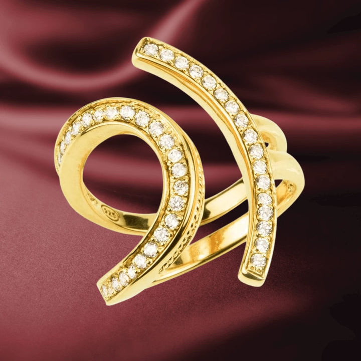 Lola Ring Gold crafted from sterling silver with gold plating, featuring a unique swirl design embellished with sparkling stones, elegant jewelry for women.