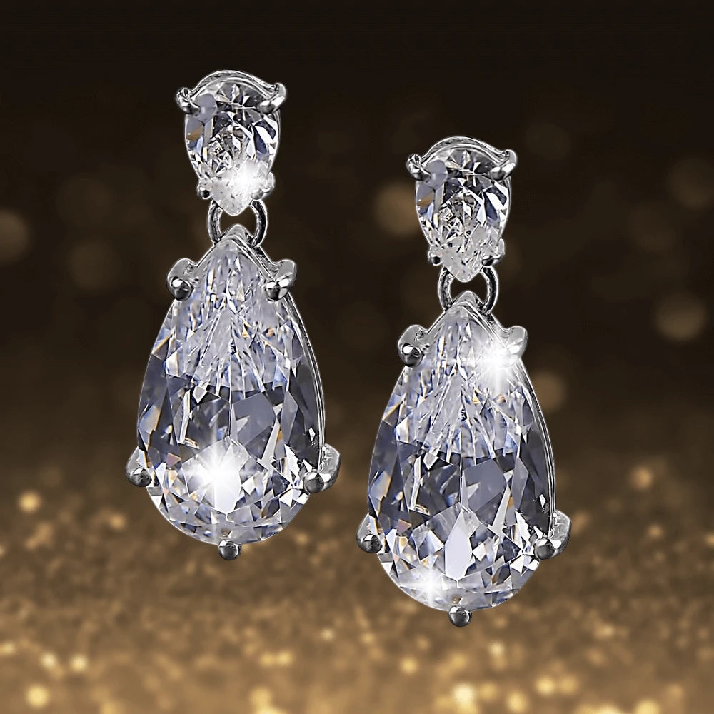 Perfect Pair Earrings featuring sterling silver with rhodium plating, showcasing elegant teardrop-shaped sparkling gemstones designed for women’s jewelry collection.