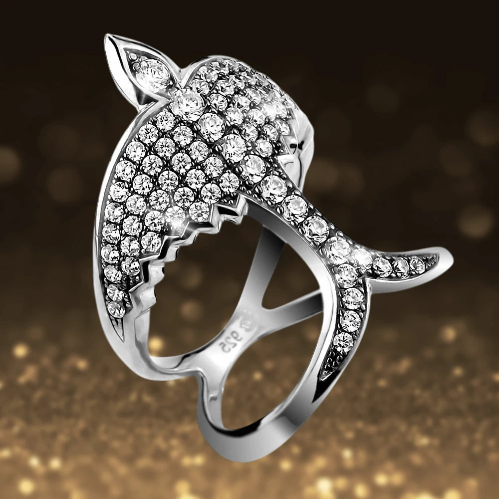 Swallows Return Rhodium Ring featuring a female sterling silver design with rhodium plating and sparkling crystal accents in an elegant swallow shape.