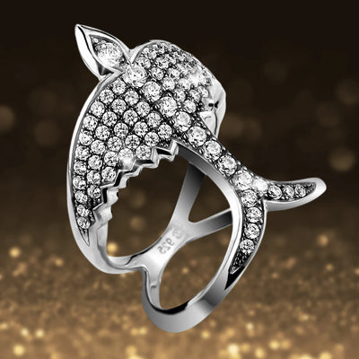 Swallows Return Rhodium Ring featuring a female sterling silver design with rhodium plating and sparkling crystal accents in an elegant swallow shape.