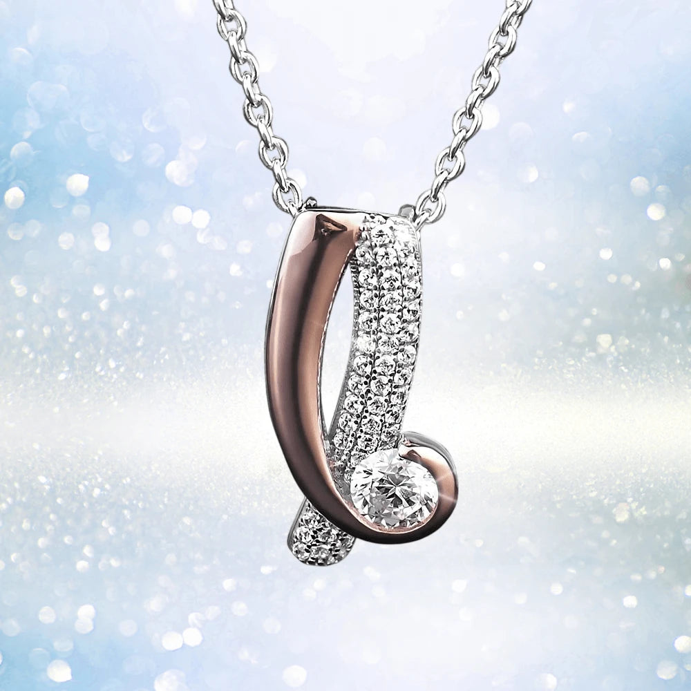 Emelia Pendant featuring a two-tone sterling silver design with sparkling crystals on a delicate chain, capturing elegant jewelry style for women.