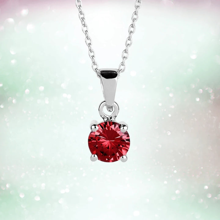 Brilliant Birthstones Pendant July featuring a vibrant red gemstone set in sterling silver with rhodium plating, designed for women’s jewelry collections.