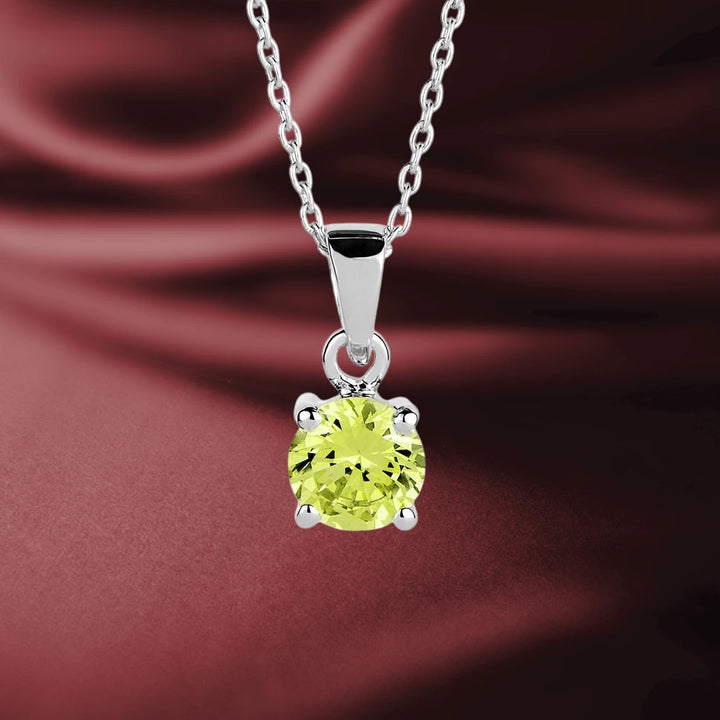 Brilliant Birthstones Pendant August featuring a round green gemstone set in sterling silver with rhodium plating, designed for female jewelry collectors.