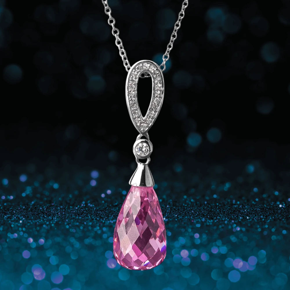 Candy Briolette Pendant featuring a sterling silver and rhodium plated setting with sparkling white stones and a faceted pink briolette drop, designed for women’s jewelry.