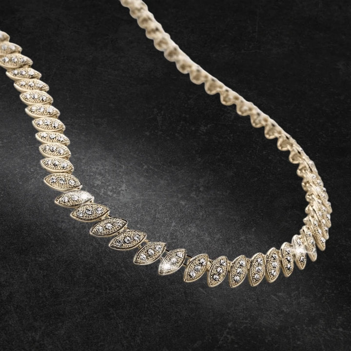 Elegant Captivating Leaf Necklace for female, featuring gold plating and a detailed leaf-inspired design with sparkling accents, perfect for refined jewelry collections.