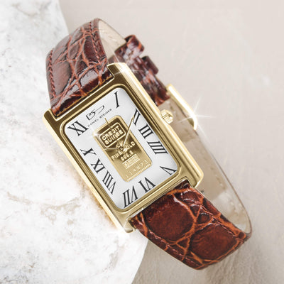 Gold Ingot Men's Watch with a gold-plated stainless steel rectangular case, white dial featuring Roman numerals, and a textured brown leather strap.