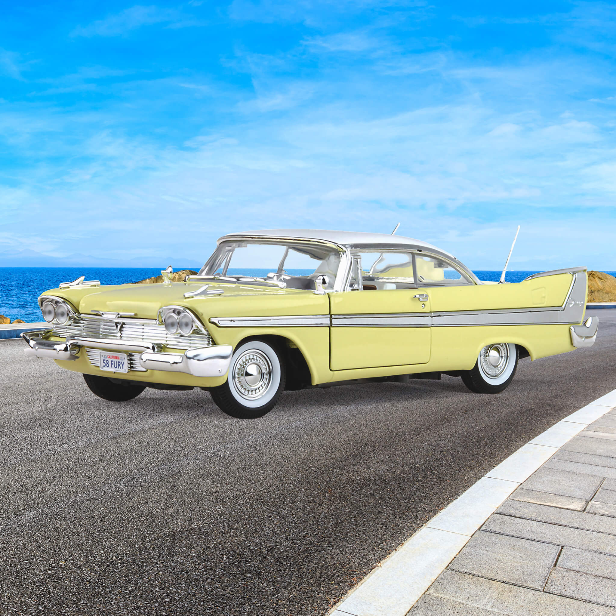 1958 Plymouth Fury - Light Yellow vintage car parked on a coastal road under a bright blue sky with ocean in the background, up to 75% off retail.