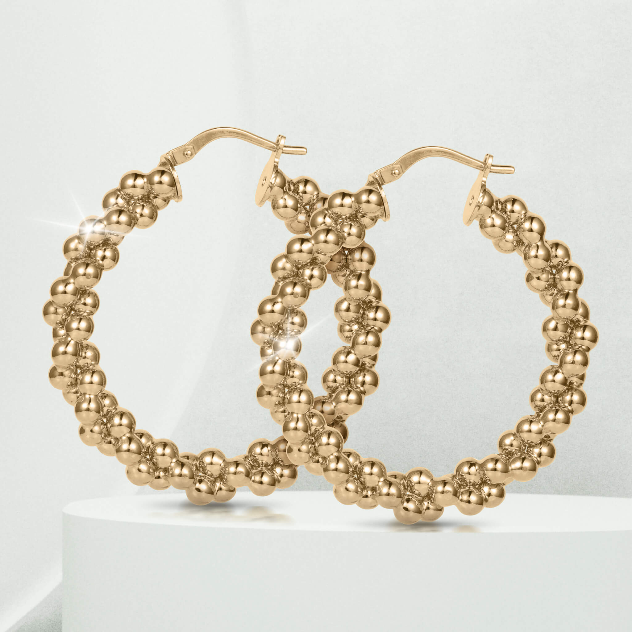 Roma Luxe Beaded Earrings featuring a gold-plated bronze beaded hoop design for women, offered Up To 75% Off Retail in elegant jewelry collection.