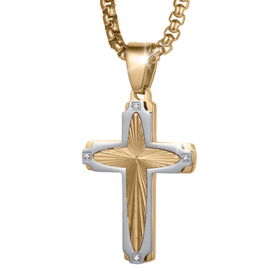 Guiding Light Cross Pendant featuring a two tone gold and silver cross with a textured center and sparkling square accents on a chain