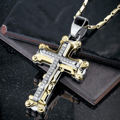 Goliath Steel Cross Pendant in two-tone stainless steel with a polished finish and embedded crystals, designed for men’s jewelry collections.