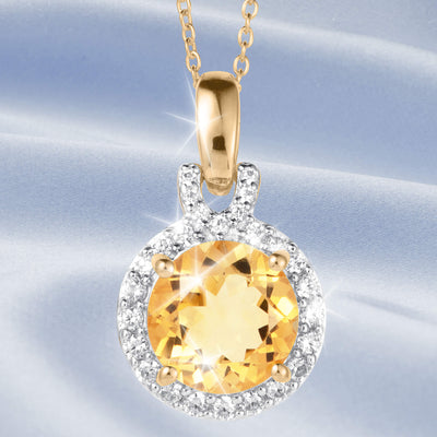 Golden Glow Collection gold pendant necklace with a round golden gemstone surrounded by sparkling clear stones on a delicate chain Up To 75% Off Retail