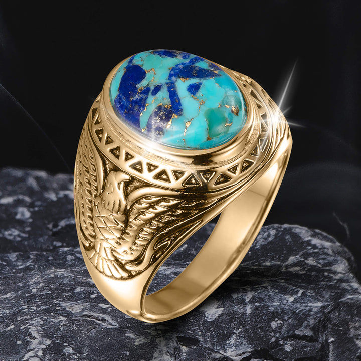 Wings Of Freedom Ring featuring a gold band with intricate eagle wing engravings and a polished turquoise stone centerpiece, designed as distinctive jewelry.