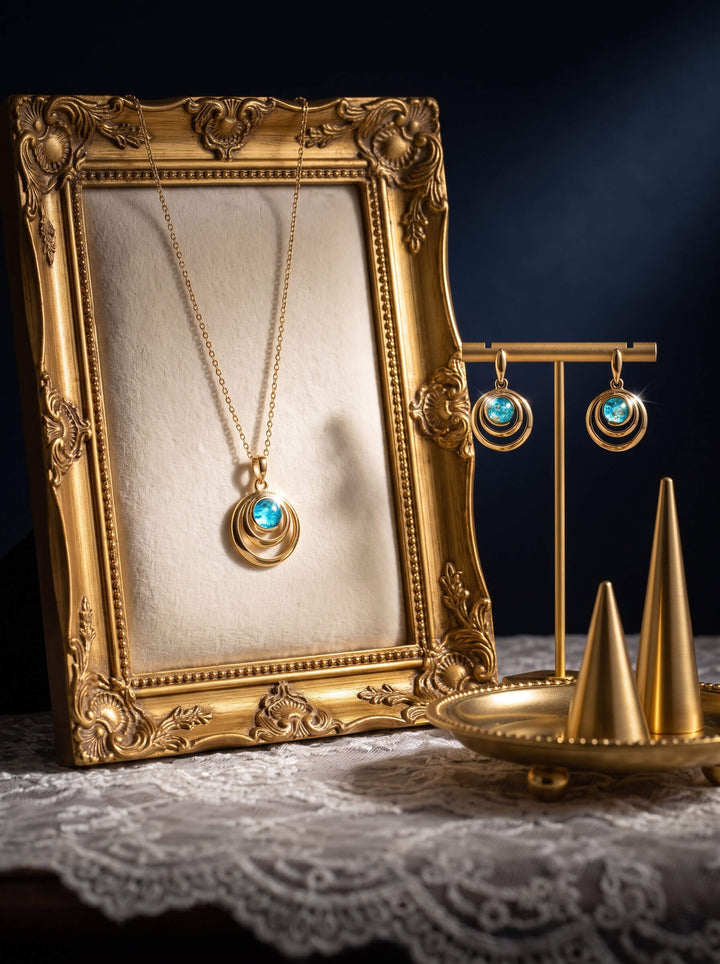 Baltic Lagoon Collection turquoise pendant necklace and matching earrings displayed in an ornate gold frame with Up To 75% Off Retail