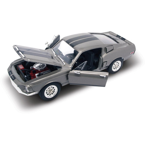 Model car with open doors on a white background. 