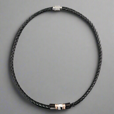 Black Diamond Leather Necklace featuring braided leather material with a sleek metallic clasp, designed for male jewelry collectors and lovers of stylish necklaces.