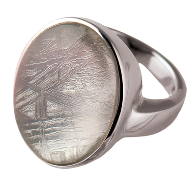 Sterling silver Meteorite Ring for female with a polished band and a textured meteorite stone centerpiece featuring unique natural patterns.