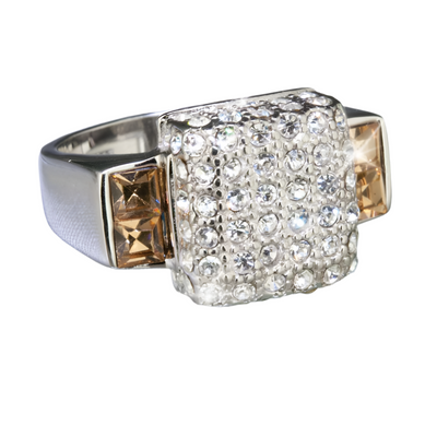 Trellis Ring in sterling silver featuring a bold square design encrusted with clear crystals and accented with champagne-colored stones, a striking jewelry piece for female wearers.