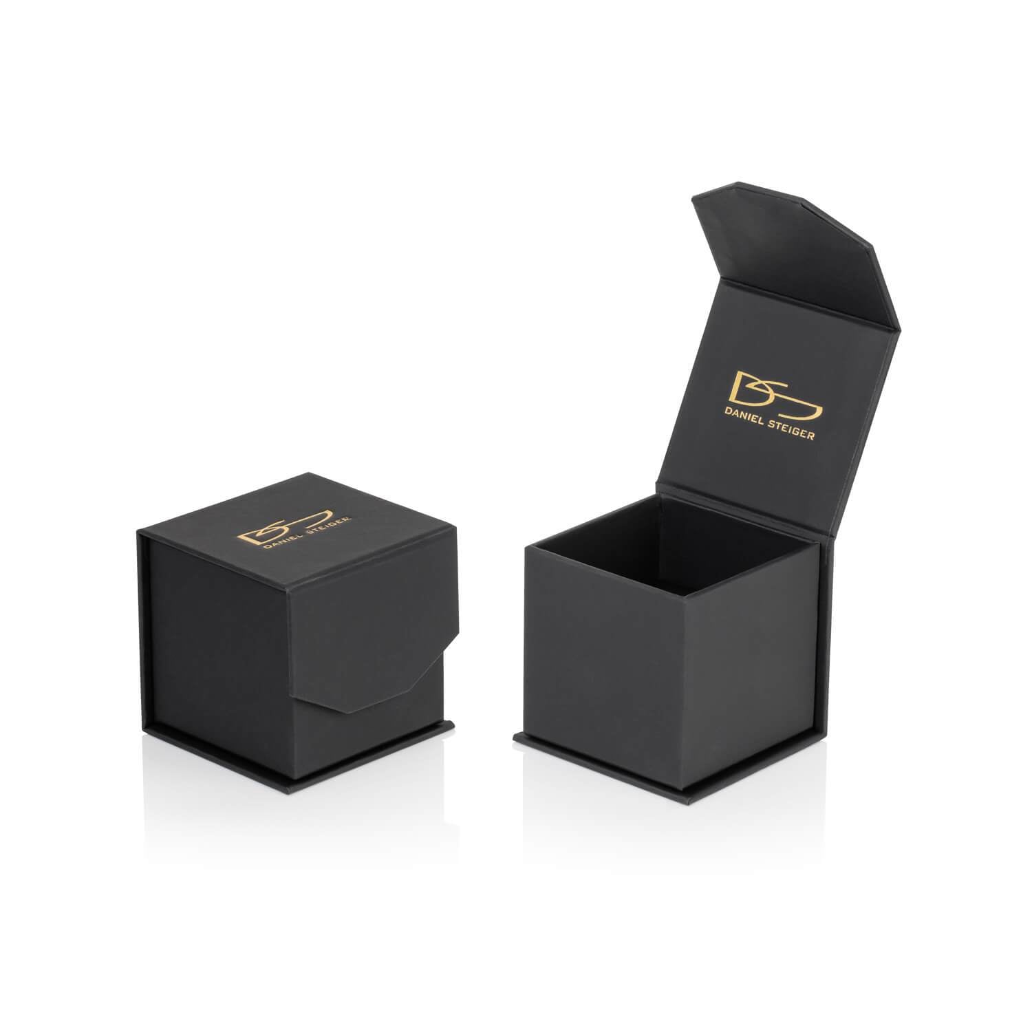 Black luxury ring box with gold DS Daniel Steiger logo, shown closed and open, designed to hold the Ultima Ring sterling silver rhodium-plated female jewelry piece.