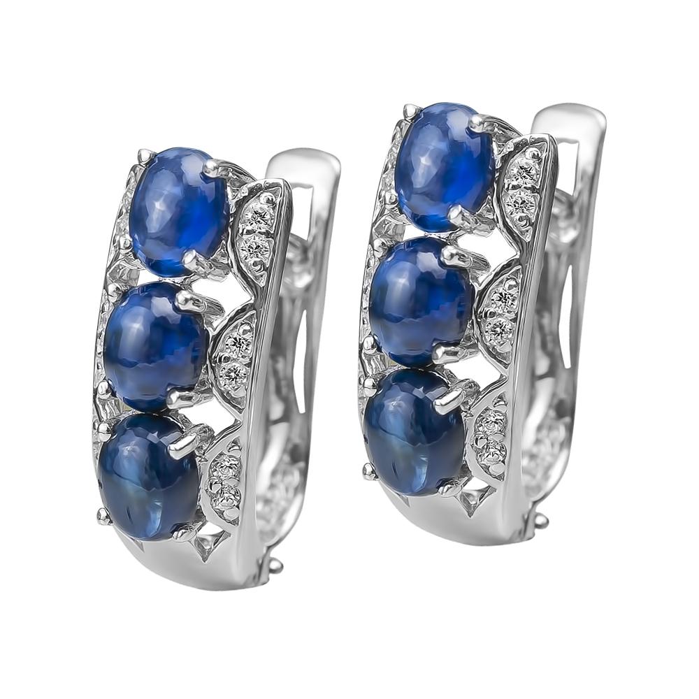 Berry Sapphire Earrings featuring three deep blue sapphire stones set in rhodium-plated sterling silver with sparkling diamond accents, designed for women’s jewelry.