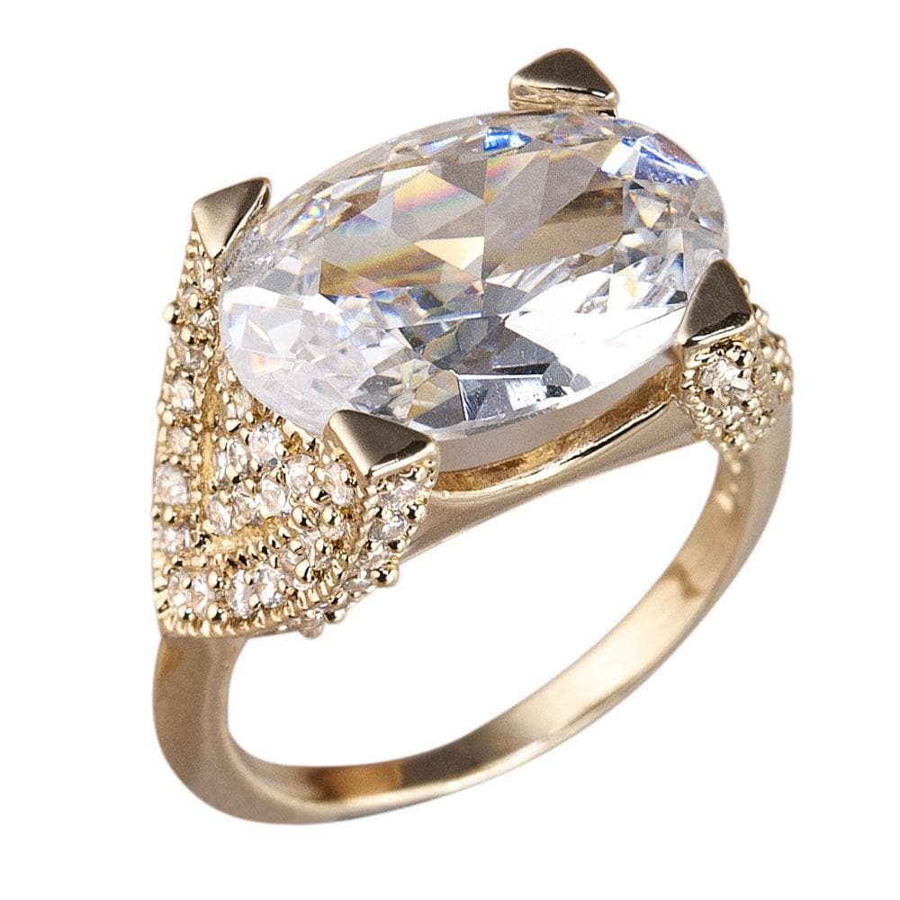 Mustique Ring featuring a large clear gemstone set in gold-plated sterling silver with intricate detailing, designed for women’s elegant jewelry collections.