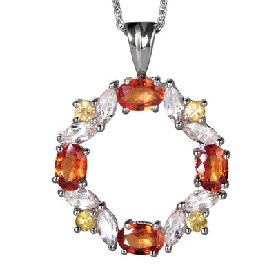 Champagne Sapphire Pendant featuring rhodium-plated sterling silver with oval champagne sapphires and clear marquise-cut stones arranged in a circular design for women’s jewelry.