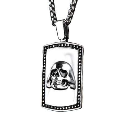 Stainless steel Skull Pendant for male featuring a detailed skull design on a rectangular pendant with decorative border, hanging from a matching chain necklace.