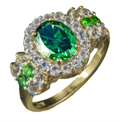 OZ Ring featuring a gold-plated sterling silver band with a large oval green gemstone surrounded by smaller clear and green stones, designed for women’s jewelry collections.