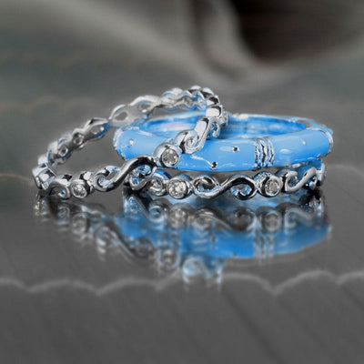 Ming Enamel Stacker Blue Rings featuring sterling silver with rhodium plating, showcasing delicate blue and silver stackable jewelry designed for women.
