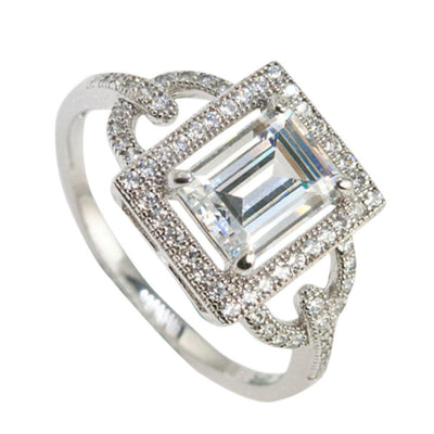 Astoria White Ring in sterling silver with rhodium plating, featuring a square-cut central stone surrounded by smaller sparkling stones, designed for women’s jewelry.