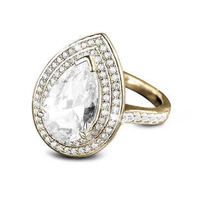 Pasha Pearshape Ring featuring a sterling silver band plated in gold, adorned with a large pear-shaped clear gemstone surrounded by two rows of smaller stones, designed for women.