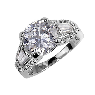 Tiara Ring crafted in sterling silver with rhodium plating, featuring a large round center stone flanked by baguette-cut stones and surrounded by smaller sparkling stones, designed for women.